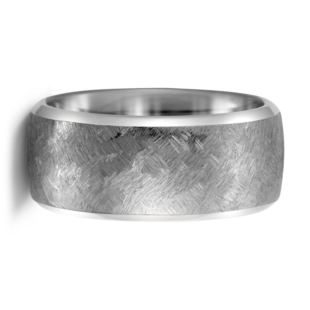 Alternative metal wedding ring in titanium with a textured surface and comfort fit inside