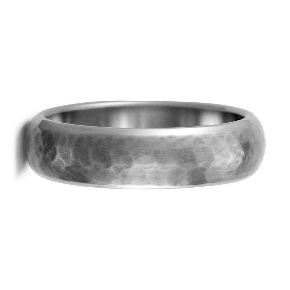 Hammered wedding ring in titanium