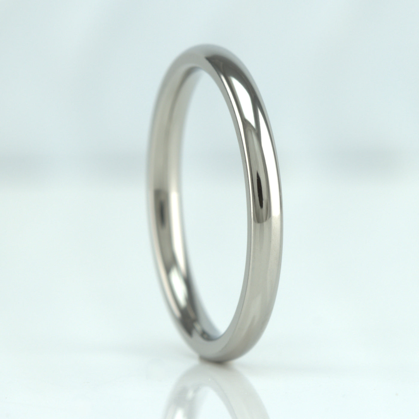 2mm polished titanium wedding ring for woman in a classic court shape