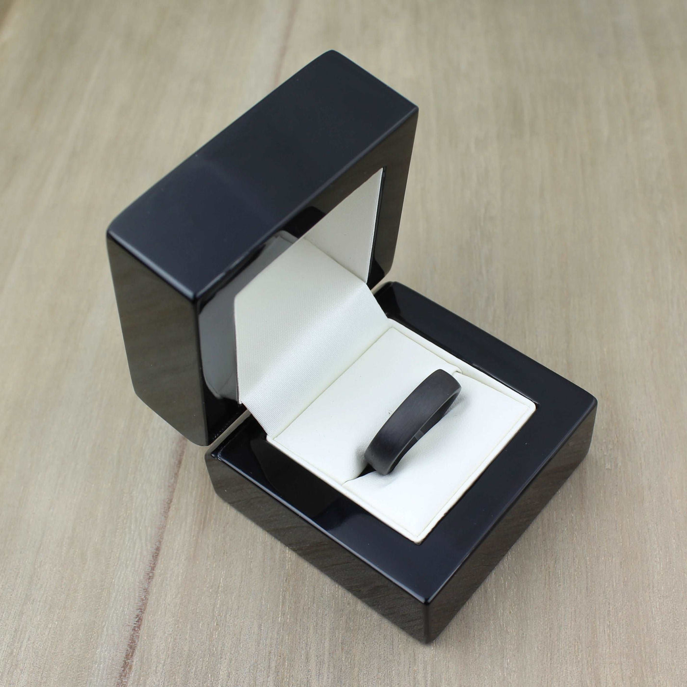 Black mans wedding ring ring band in carbon fibre. Court shape brushed 3mm 4mm