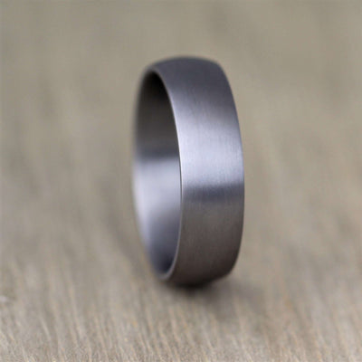 Matt/Satin Tantaum wedding band. 6mm wide with comfort fit and slight dome. Comes with free engraveing