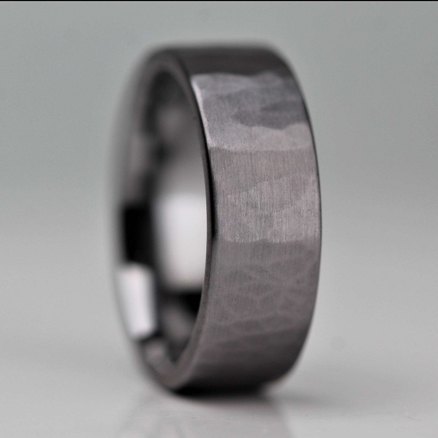 7mm wide flat Tantalum wedding ring with a hammered, brushed finish. alternative metal wedding ring