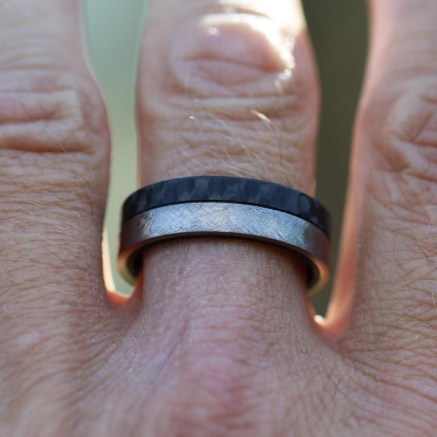 Titanium and forged carbon fibre wedding ring band. half black and half silver. scratched finish comfort fit flat court 8mm on mans finger groom