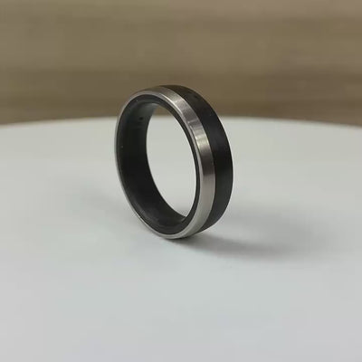 black mans alterbative wedding ring bandin carbon fibre and palladium