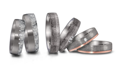 collection of tantalum wedding rings with different surface textured